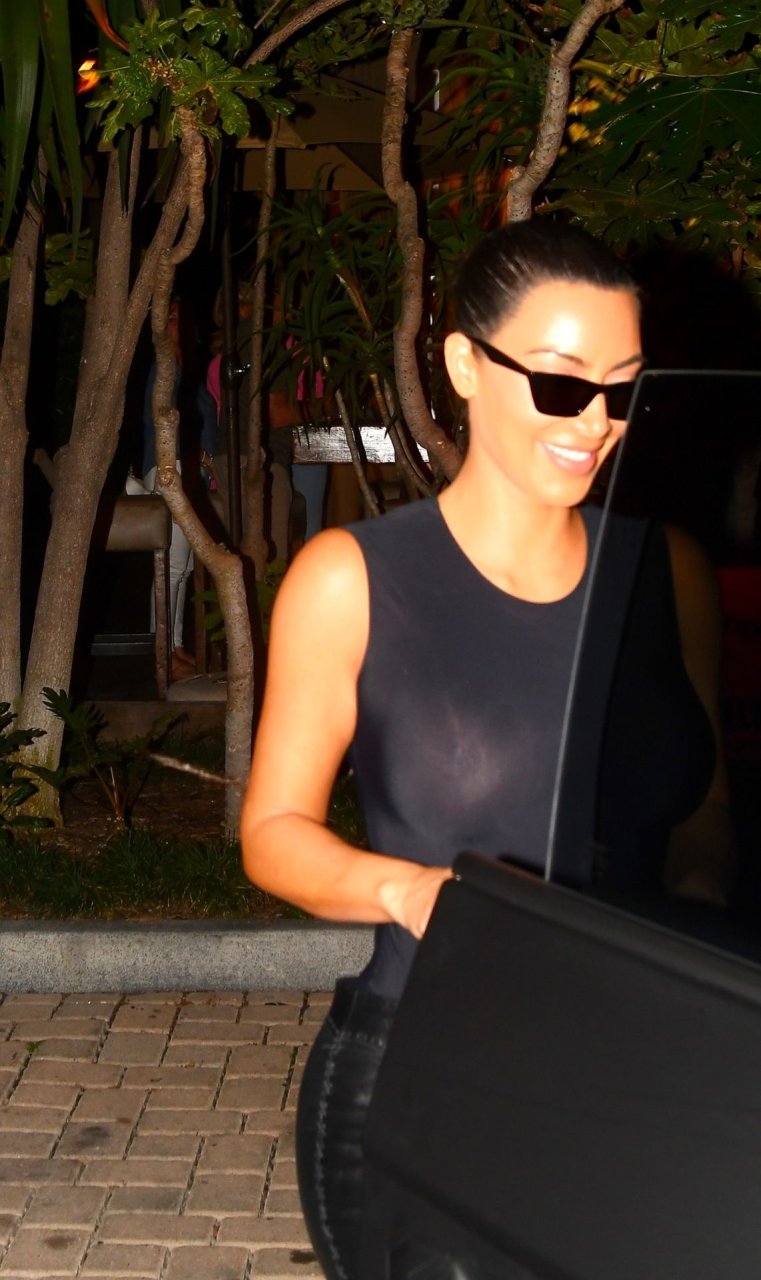 Kim Kardashian Displaying Her Sexy Breasts in a See-Through Get-Up