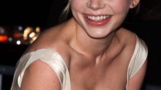 Blond-Haired Hottie Michelle Williams Shows Her Boobs with a Cute Smile on Her Face