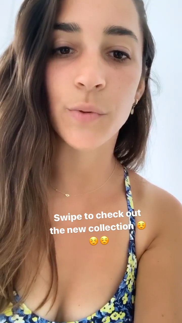 Stunning Brunette Aly Raisman Showing Her Cleavage While Selling Shit