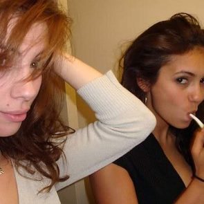Nina Dobrev washing teeth