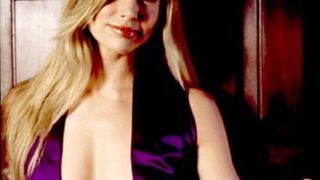 Busty Blonde Brooke Burns Showing Her Cleavage in a Purple Dress