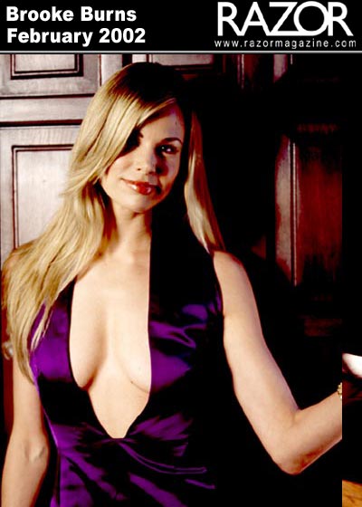 Busty Blonde Brooke Burns Showing Her Cleavage in a Purple Dress