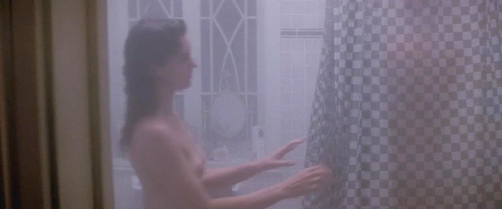 Elizabeth Perkins sexy and topless