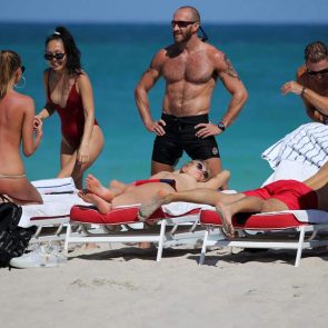 Toni Garrn lying on sunbed