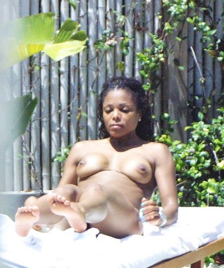 Janet Jackson nude sunbathing