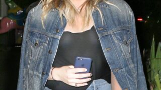 Hot Girl Chloë Grace Moretz Showing Her Cleavage in a See-Through Black Top