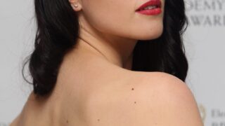 Stunning TV Actress Katie McGrath Shows Her Sexy Back and Smiles Seductively