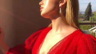 Leggy Stunner Peyton List Shows Her Cleavage and Legs in a Sexy Red Outfit