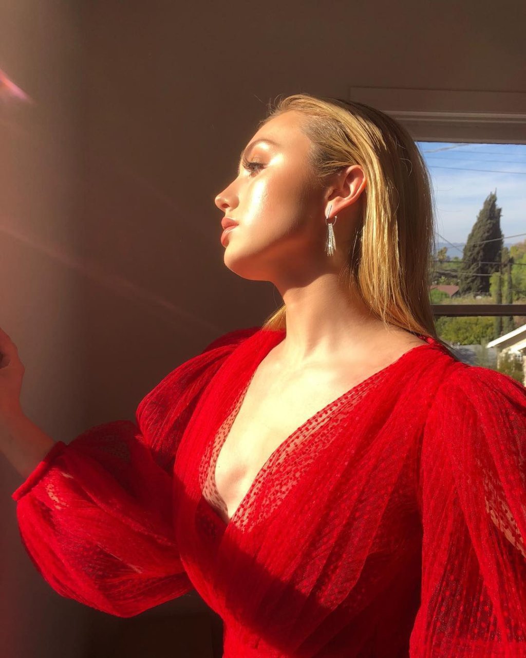 Leggy Stunner Peyton List Shows Her Cleavage and Legs in a Sexy Red Outfit