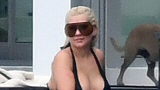 Legendary Blonde Stunner Christina Aguilera Shows Her Ass in a Sexy Swimsuit