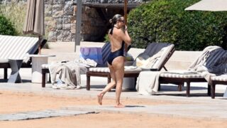 Blonde Hottie Kate Hudson Shows Her Breasts in a Revealing Black Swimsuit