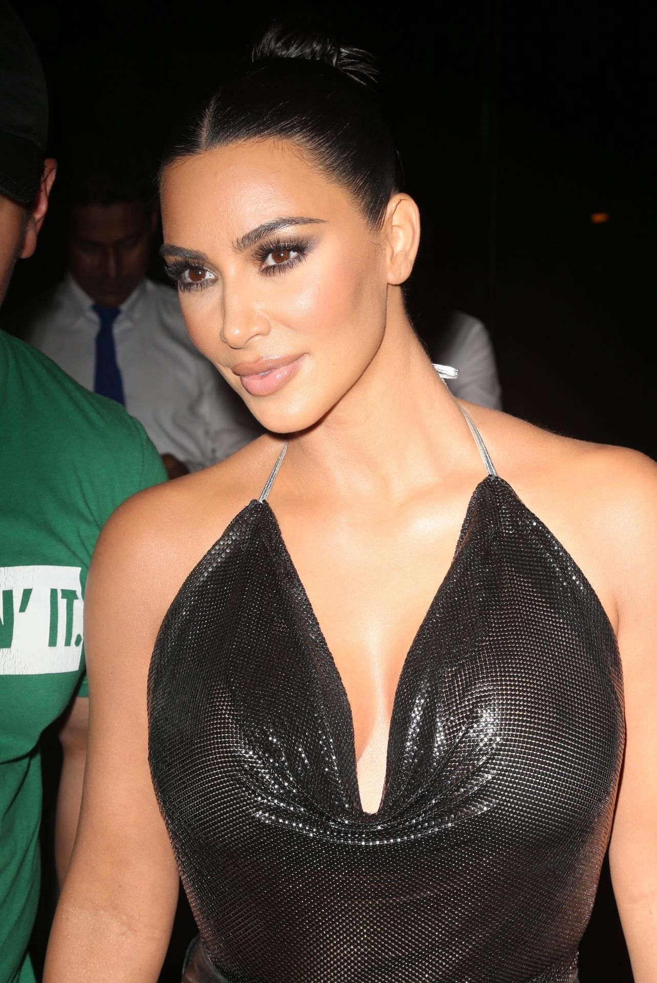 Buxom Brunette Kim Kardashian Showing Her Tits in a See-Through Outfit
