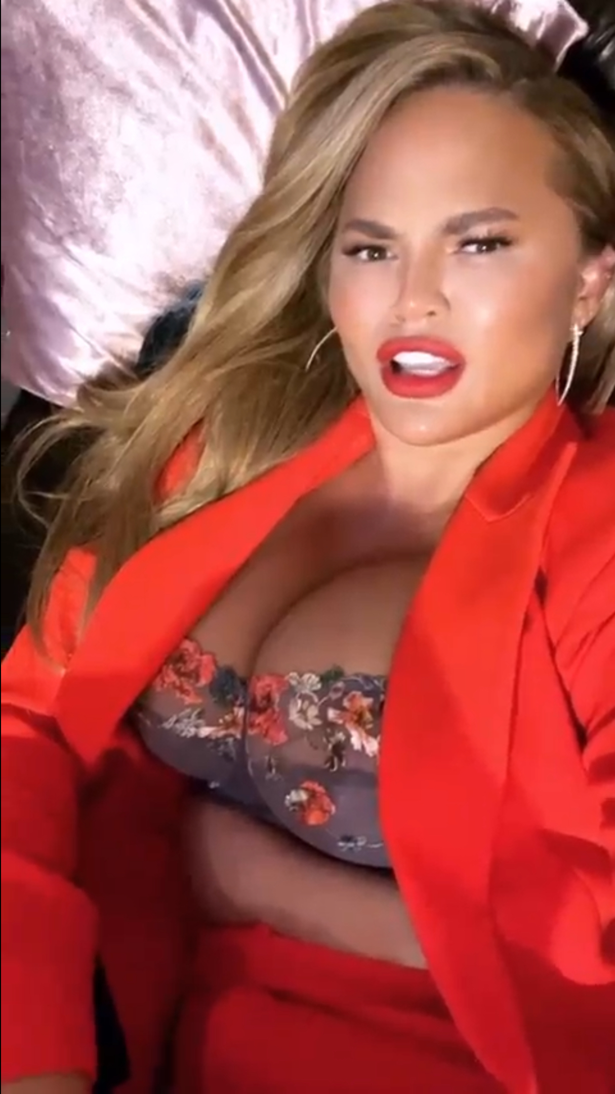 Chesty Lady Chrissy Teigen Displaying Her Wonderful Cleavage in a Brazen Outfit