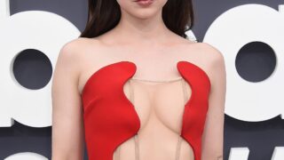 Dove Cameron Showing Cleavage in a Very Sexy Red Dress
