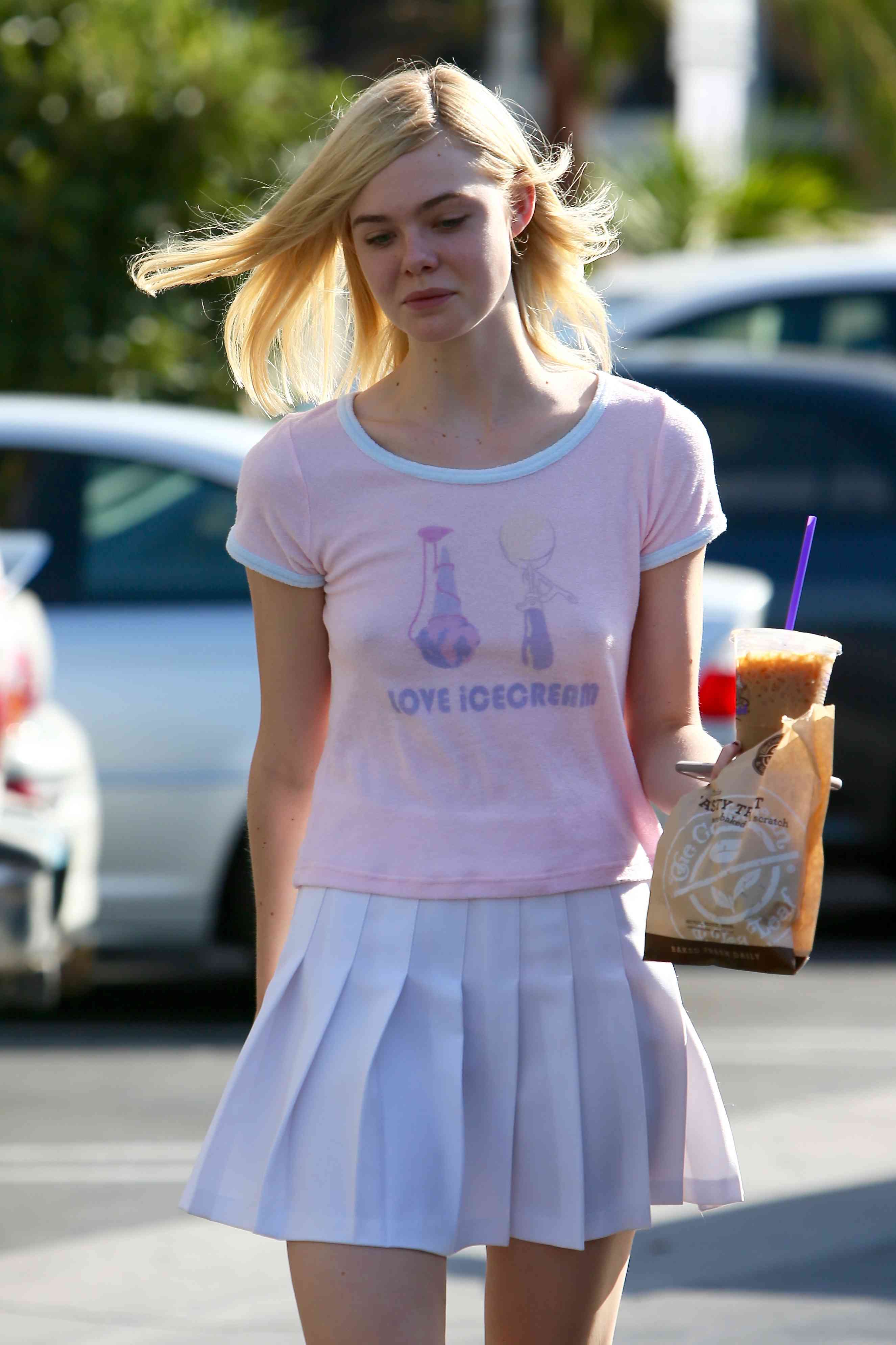 Elle Fanning picks up coffee and pastry